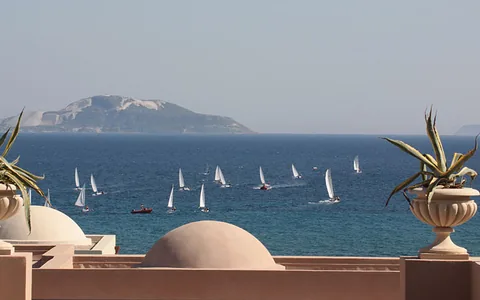 Sailboats on the sea viewed from a terrace in Kos, Greece.